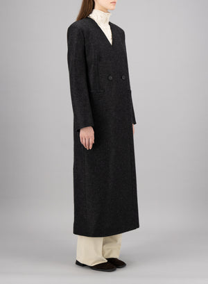 Uncollared coat with shoulder pads pressed wool