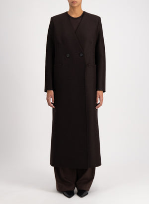 Uncollared coat with shoulder pads pressed wool