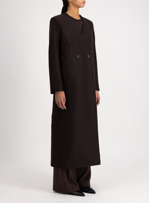 Uncollared coat with shoulder pads pressed wool