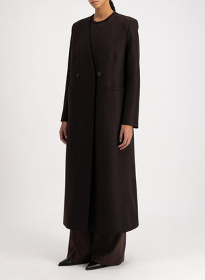 Uncollared coat with shoulder pads pressed wool