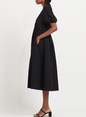 Dress with puff sleeves in creased cotton