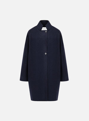 Raglan cape in boiled wool