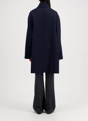 Raglan cape in boiled wool