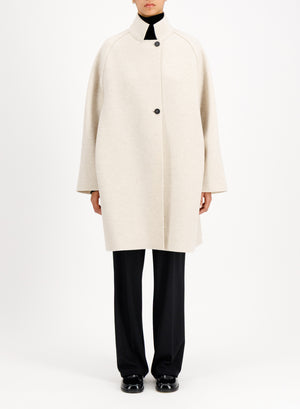 Raglan cape in boiled wool