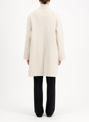 Raglan cape in boiled wool