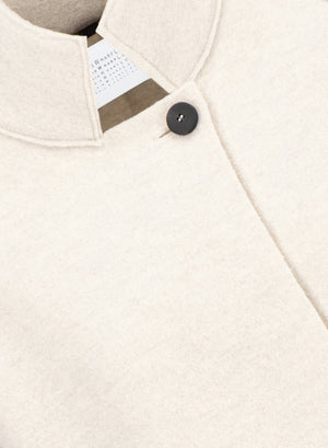 Raglan cape in boiled wool