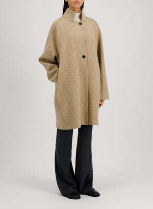 Raglan cape in boiled wool