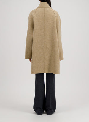 Raglan cape in boiled wool