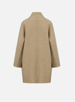 Raglan cape in boiled wool