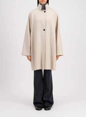 Raglan cape in pressed wool