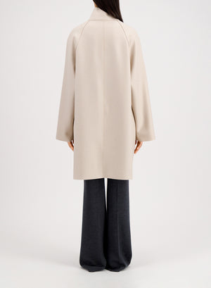 Raglan cape in pressed wool