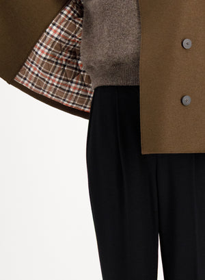 Oversized short trench in pressed wool with quilted lining