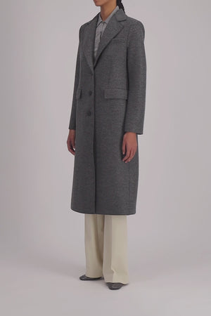 Coat with shoulder pads pressed wool