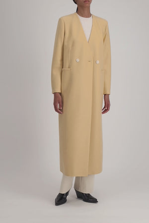 Uncollared coat in light pressed wool