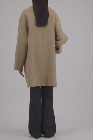 Raglan cape in boiled wool