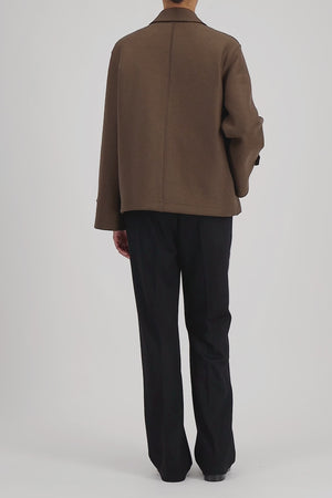 Oversized short trench in pressed wool with quilted lining