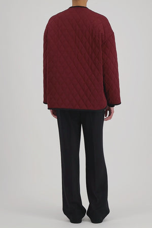 Uncollared quilted jacket