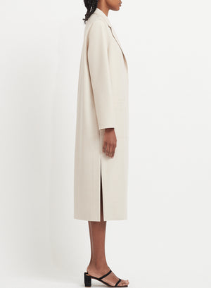 Long boxy coat in light pressed wool