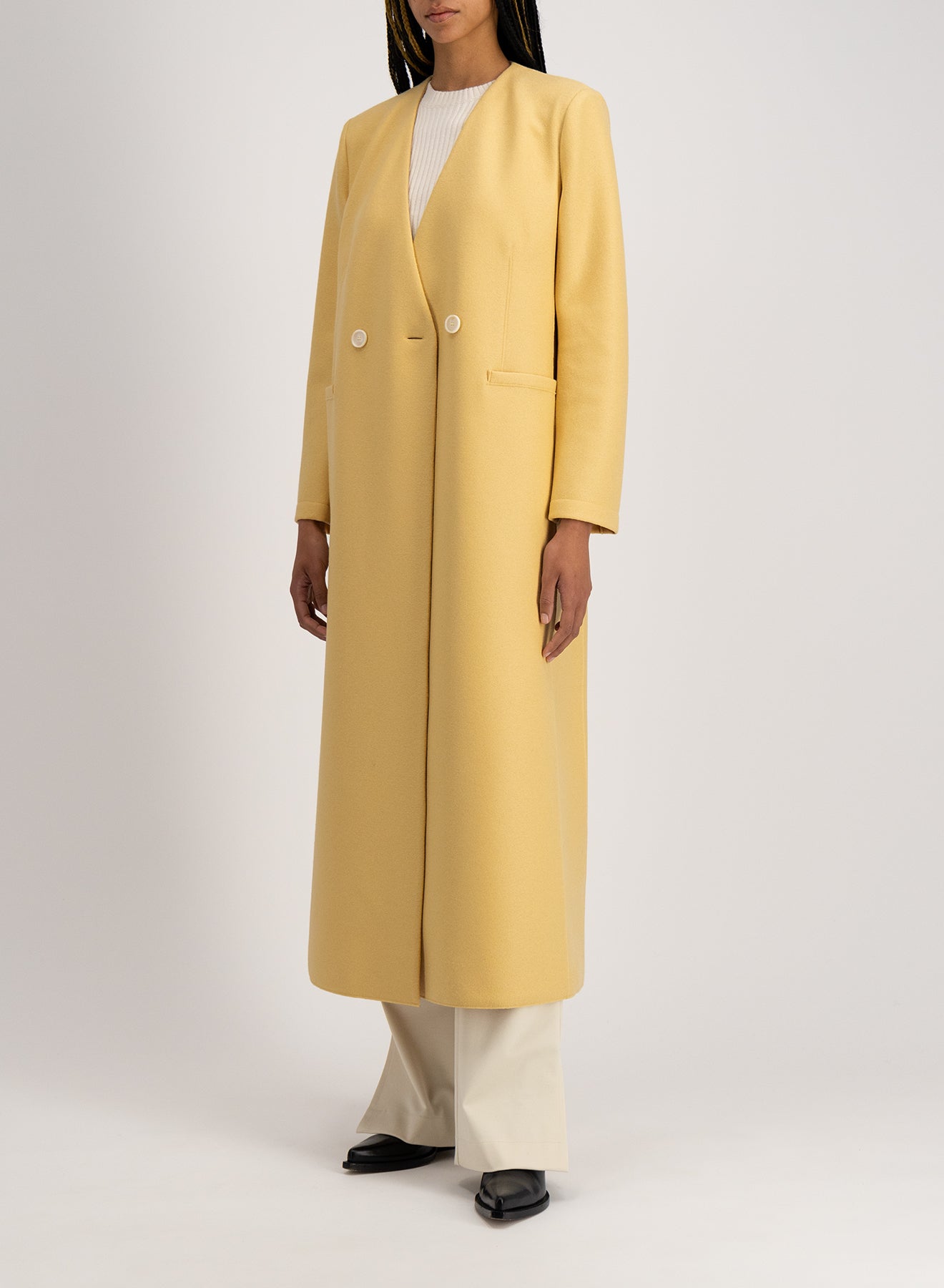 Uncollared coat in light pressed wool